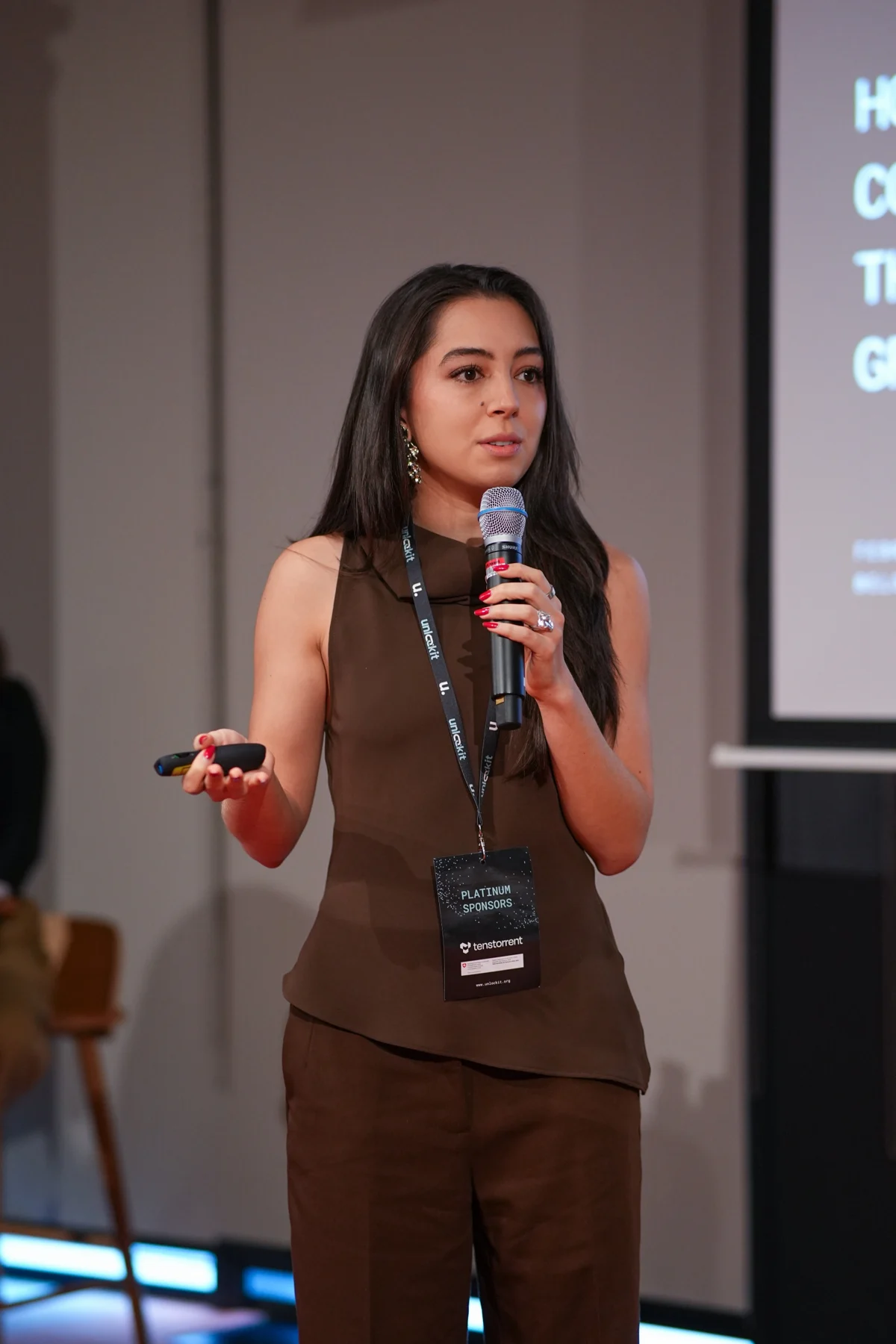 Diandra Escobar sharing her expertise on stage at a conference